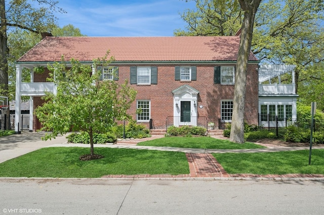 350 Elder Ln, Winnetka, IL 60093 - view of front facade featuring a tile roof and brick siding