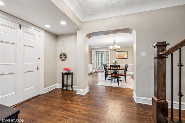 350 Elder Ln, Winnetka, IL 60093 - foyer with arched walkways, baseboards, dark wood finished floors, and recessed lighting