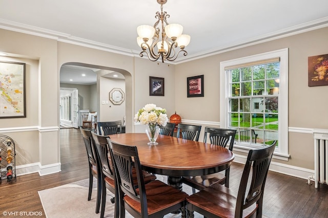 350 Elder Ln, Winnetka, IL 60093 - dining room featuring arched walkways, wood finished floors, crown molding, baseboards, and a chandelier