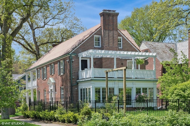 350 Elder Ln, Winnetka, IL 60093 - back of property featuring a pergola, a balcony, a chimney, and brick siding