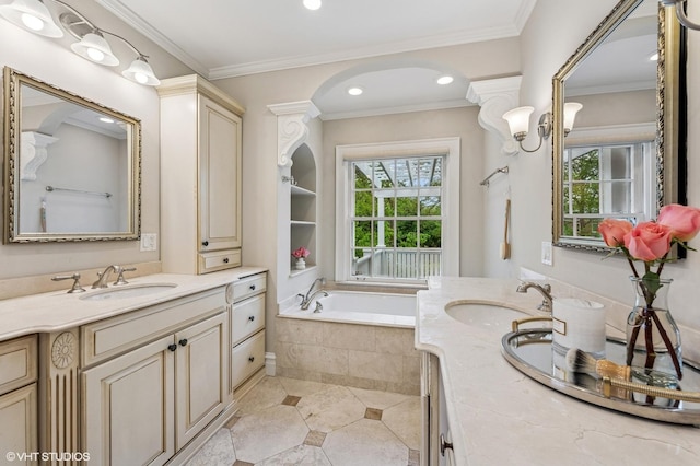 350 Elder Ln, Winnetka, IL 60093 - bathroom featuring two vanities, plenty of natural light, a garden tub, and recessed lighting