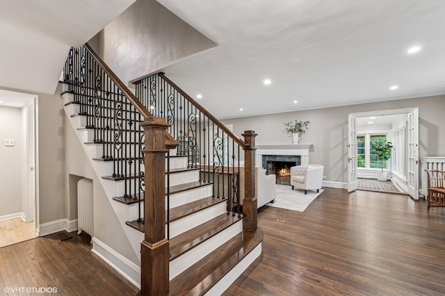 350 Elder Ln, Winnetka, IL 60093 - staircase with wood finished floors, a high end fireplace, baseboards, and recessed lighting