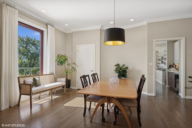 2122 N Hudson Ave, Chicago, IL 60614 - dining space featuring dark wood-style floors, crown molding, recessed lighting, and baseboards