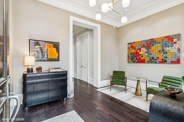 542 W Dickens St, Chicago, IL 60614 - sitting room featuring a chandelier, wood finished floors, crown molding, and baseboards