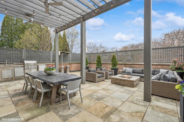 542 W Dickens St, Chicago, IL 60614 - fenced backyard with an outdoor living space with a fire pit, outdoor dining space, a pergola, and a patio area