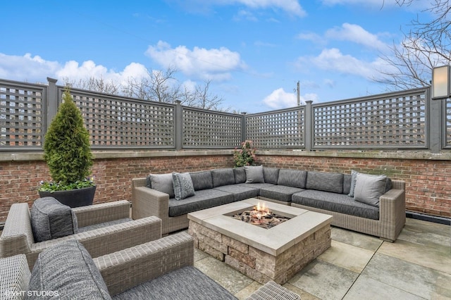 542 W Dickens St, Chicago, IL 60614 - fenced backyard featuring an outdoor living space with a fire pit and a patio