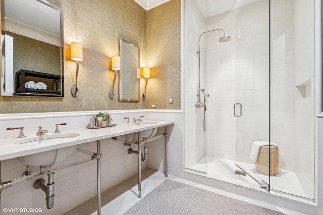 542 W Dickens St, Chicago, IL 60614 - bathroom featuring a stall shower, wallpapered walls, and a wainscoted wall