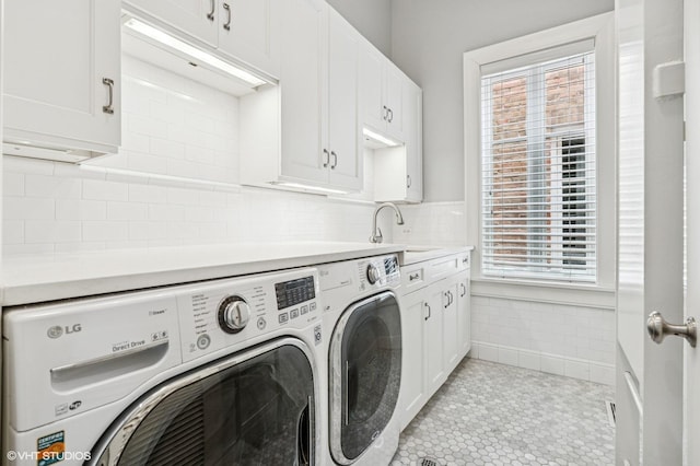 542 W Dickens St, Chicago, IL 60614 - washroom with washing machine and dryer and cabinet space