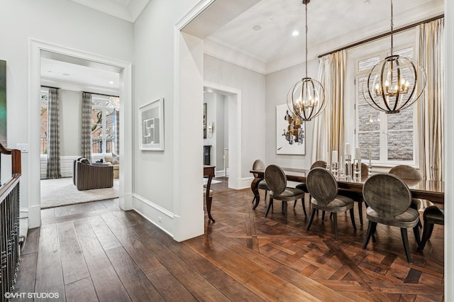 542 W Dickens St, Chicago, IL 60614 - dining room with a chandelier, crown molding, and baseboards