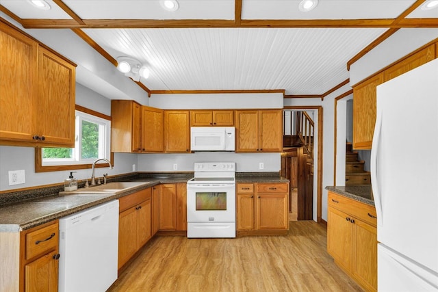 404 S Neal St, Camargo, IL 61919 - kitchen with white appliances, a sink, light wood-style floors, dark countertops, and recessed lighting