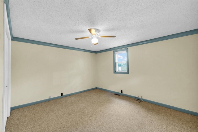 404 S Neal St, Camargo, IL 61919 - empty room featuring carpet floors, ceiling fan, baseboards, and a textured ceiling
