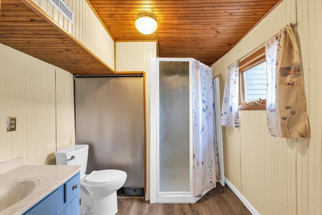 404 S Neal St, Camargo, IL 61919 - bathroom with wood ceiling, a shower stall, wood finished floors, vanity, and toilet