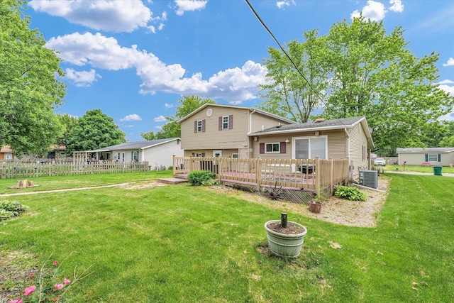 404 S Neal St, Camargo, IL 61919 - rear view of house featuring central air condition unit and a wooden deck