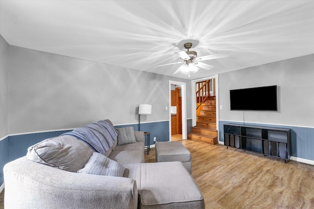 404 S Neal St, Camargo, IL 61919 - living room with stairs, wood finished floors, ceiling fan, and baseboards
