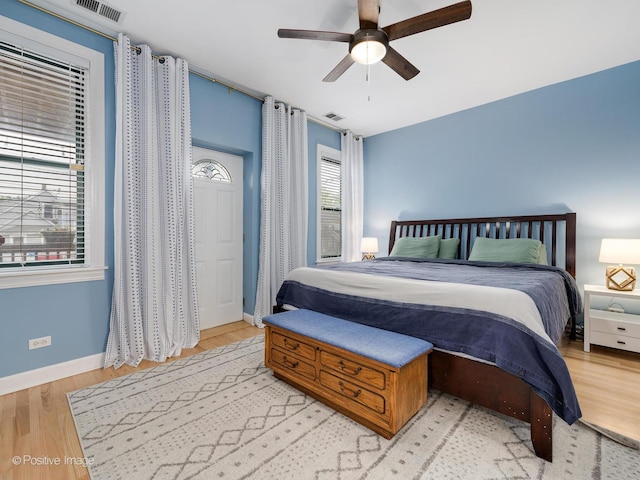 2636 N Fairfield Ave Unit 1N, Chicago, IL 60647 - bedroom with baseboards, wood finished floors, and a ceiling fan
