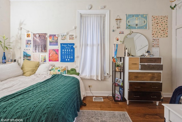 1120 W Newport Ave, Chicago, IL 60657 - bedroom featuring wood finished floors and baseboards