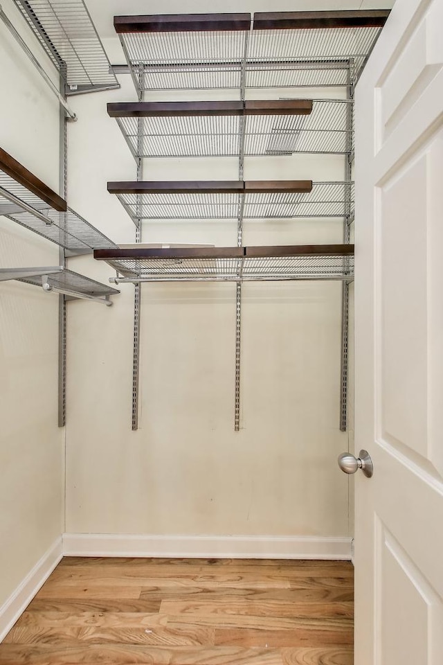 1935 S State St Unit 4, Chicago, IL 60616 - walk in closet with light wood-style flooring