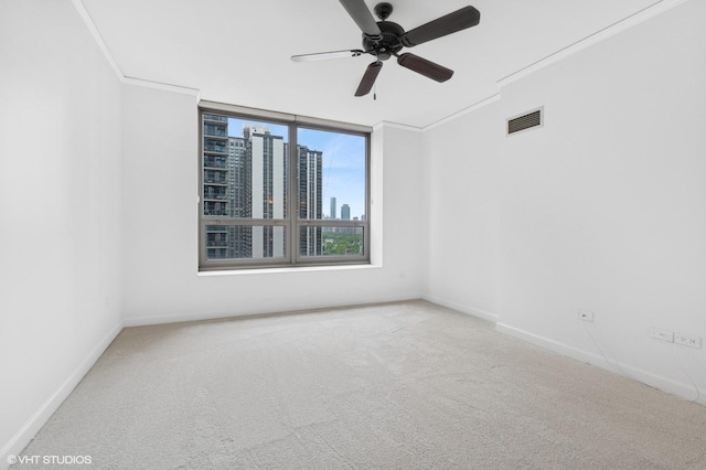 420 E Waterside Dr Unit 1103, Chicago, IL 60601 - carpeted empty room featuring ceiling fan, baseboards, ornamental molding, and a city view