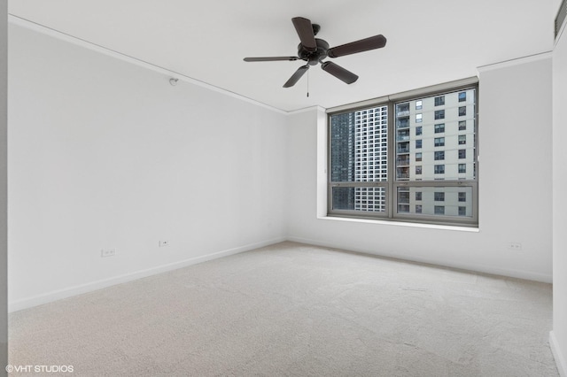 420 E Waterside Dr Unit 1103, Chicago, IL 60601 - spare room with carpet flooring, ceiling fan, baseboards, and healthy amount of natural light