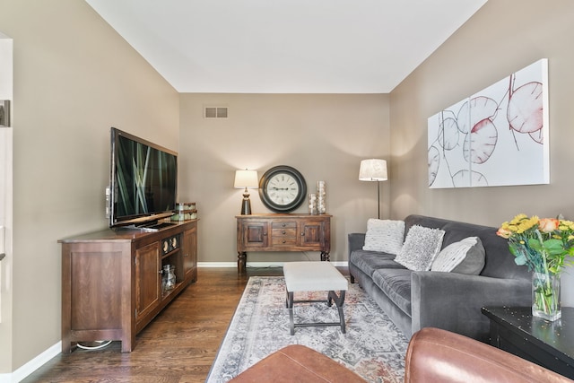 3401 Charlemaine Dr, Aurora, IL 60504 - living room featuring dark wood-style floors and baseboards