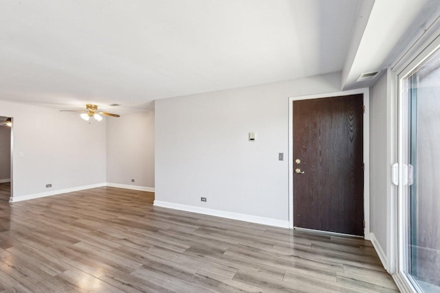 501 Mchenry Rd Unit 3B, Wheeling, IL 60090 - unfurnished room featuring ceiling fan, light wood-style floors, and baseboards