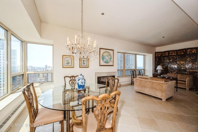800 N Michigan Ave Unit 3203, Chicago, IL 60611 - dining space featuring light tile patterned floors and a chandelier