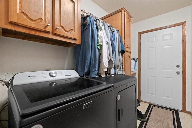 26630 W Il Route 134, Ingleside, IL 60041 - laundry area featuring independent washer and dryer and cabinet space