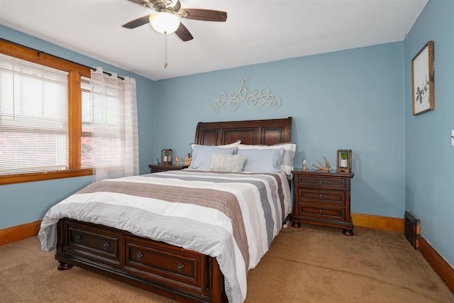 106 W Boundary St, Stanford, IL 61774 - carpeted bedroom featuring baseboards and a ceiling fan