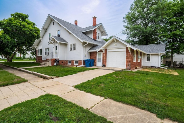 106 W Boundary St, Stanford, IL 61774 - view of front of property with concrete driveway, a garage, a chimney, a front yard, and roof with shingles