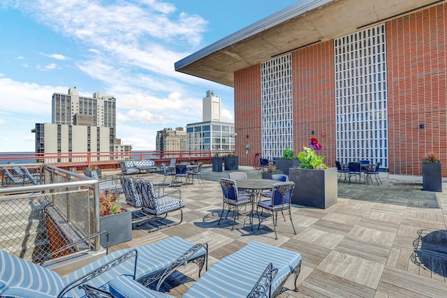 1325 N State Pkwy Unit 17C, Chicago, IL 60610 - view of patio featuring outdoor dining space