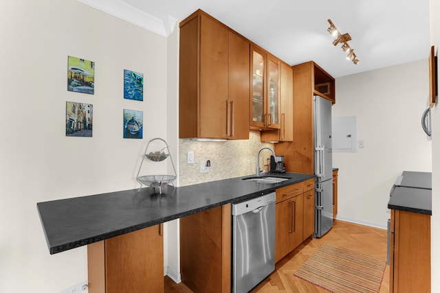 1325 N State Pkwy Unit 17C, Chicago, IL 60610 - kitchen with stainless steel dishwasher, a sink, freestanding refrigerator, dark countertops, and backsplash