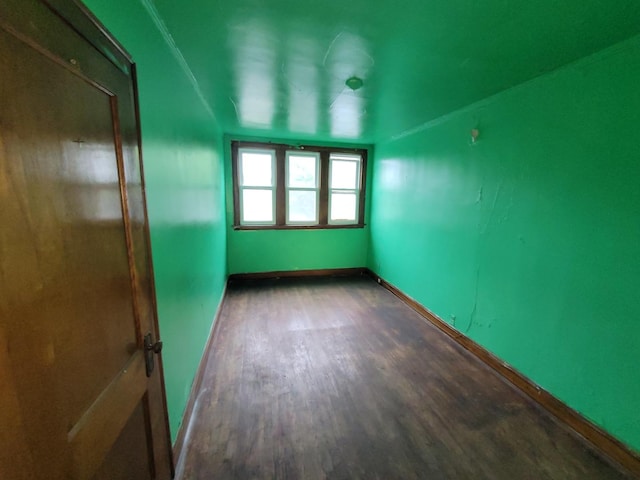7118 S Morgan St, Chicago, IL 60621 - spare room with wood finished floors and baseboards