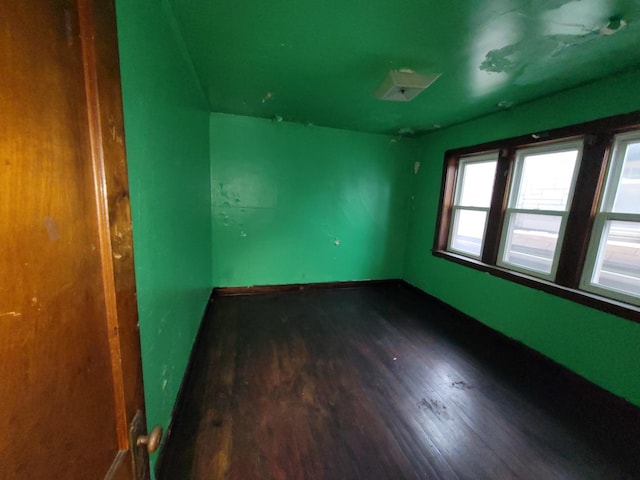 7118 S Morgan St, Chicago, IL 60621 - empty room featuring wood finished floors and baseboards