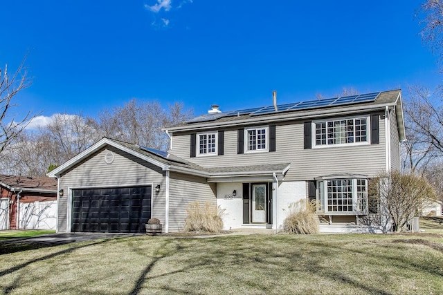 6S009 Steeple Run Dr, Naperville, IL 60540 - traditional-style home featuring roof mounted solar panels, a front yard, an attached garage, a chimney, and brick siding