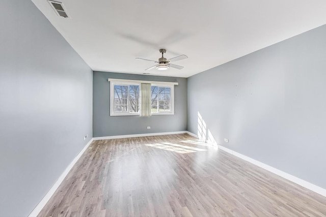 6S009 Steeple Run Dr, Naperville, IL 60540 - spare room with a ceiling fan, light wood-style flooring, and baseboards