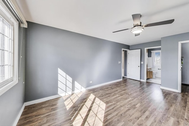 6S009 Steeple Run Dr, Naperville, IL 60540 - unfurnished bedroom with wood finished floors, baseboards, ensuite bathroom, and a ceiling fan