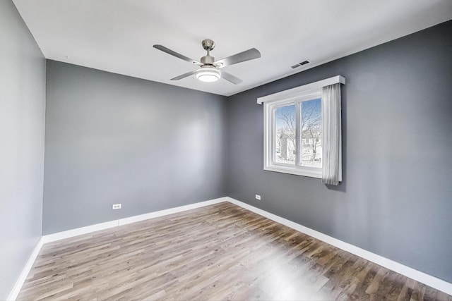 6S009 Steeple Run Dr, Naperville, IL 60540 - unfurnished room with wood finished floors, ceiling fan, and baseboards