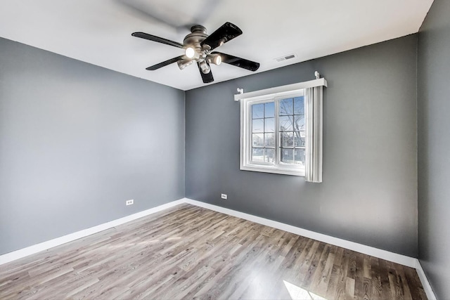 6S009 Steeple Run Dr, Naperville, IL 60540 - spare room with wood finished floors, baseboards, and a ceiling fan