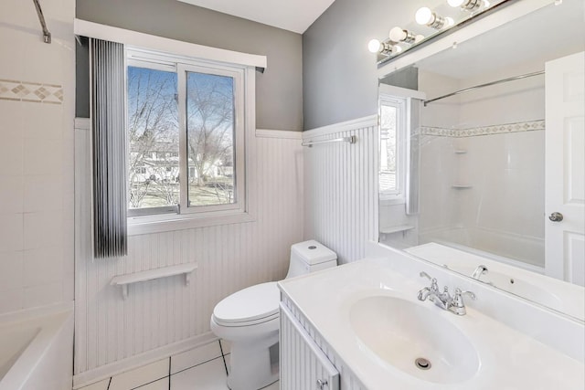 6S009 Steeple Run Dr, Naperville, IL 60540 - bathroom featuring toilet, tile patterned flooring, bathing tub / shower combination, vanity, and wainscoting