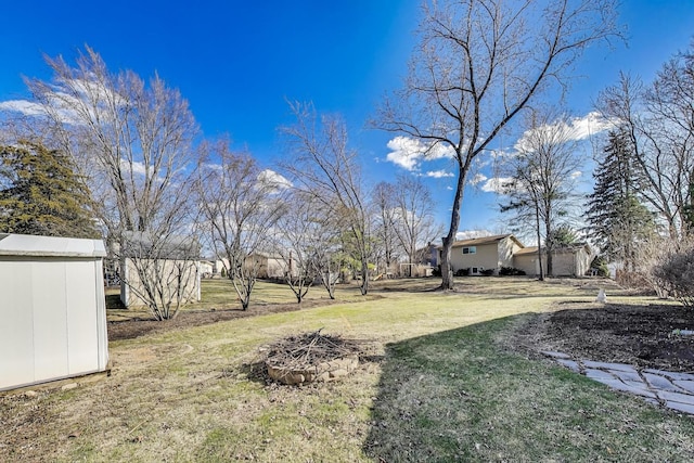 6S009 Steeple Run Dr, Naperville, IL 60540 - view of grassy yard featuring an outdoor structure
