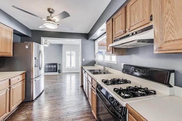 6S009 Steeple Run Dr, Naperville, IL 60540 - kitchen featuring gas stove, under cabinet range hood, a sink, stainless steel refrigerator with ice dispenser, and a ceiling fan