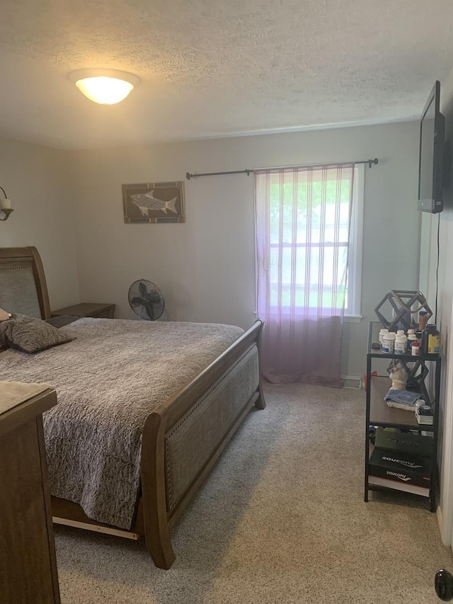 43 Kenfield Cir, Bloomington, IL 61704 - carpeted bedroom featuring a textured ceiling