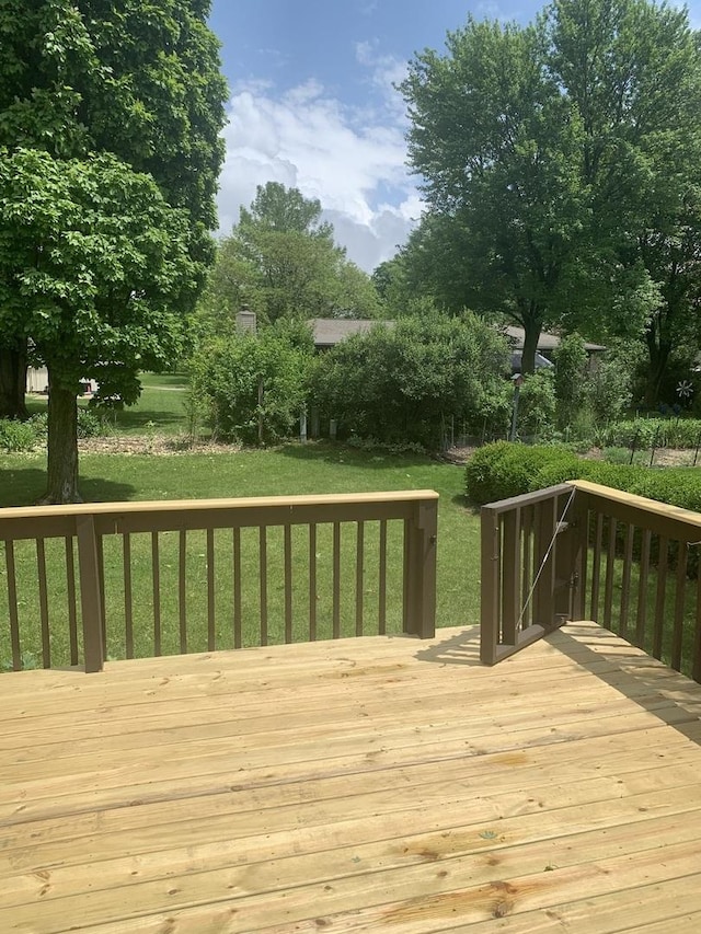43 Kenfield Cir, Bloomington, IL 61704 - wooden deck featuring a lawn