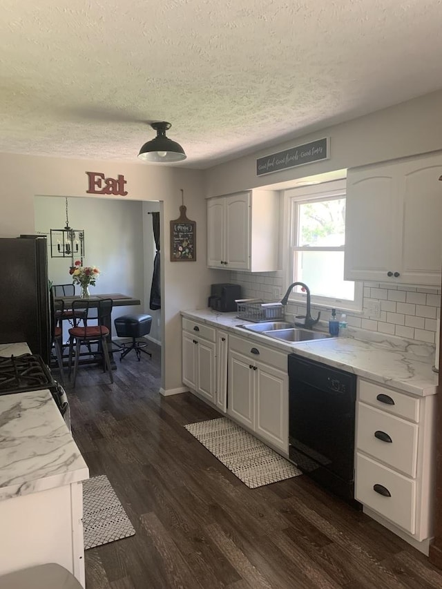 43 Kenfield Cir, Bloomington, IL 61704 - kitchen with black appliances, a sink, a textured ceiling, white cabinets, and backsplash