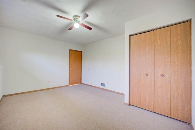 38059 N Holdridge Ave, Beach Park, IL 60087 - unfurnished bedroom with carpet floors, baseboards, a closet, and ceiling fan