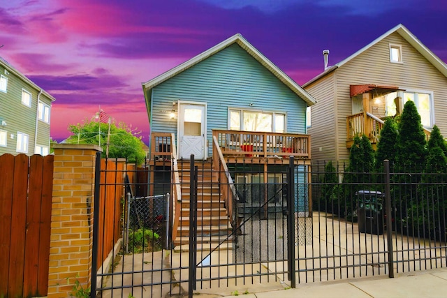 4815 S Bishop St, Chicago, IL 60638 - view of front of home with stairway, a gate, and a fenced front yard