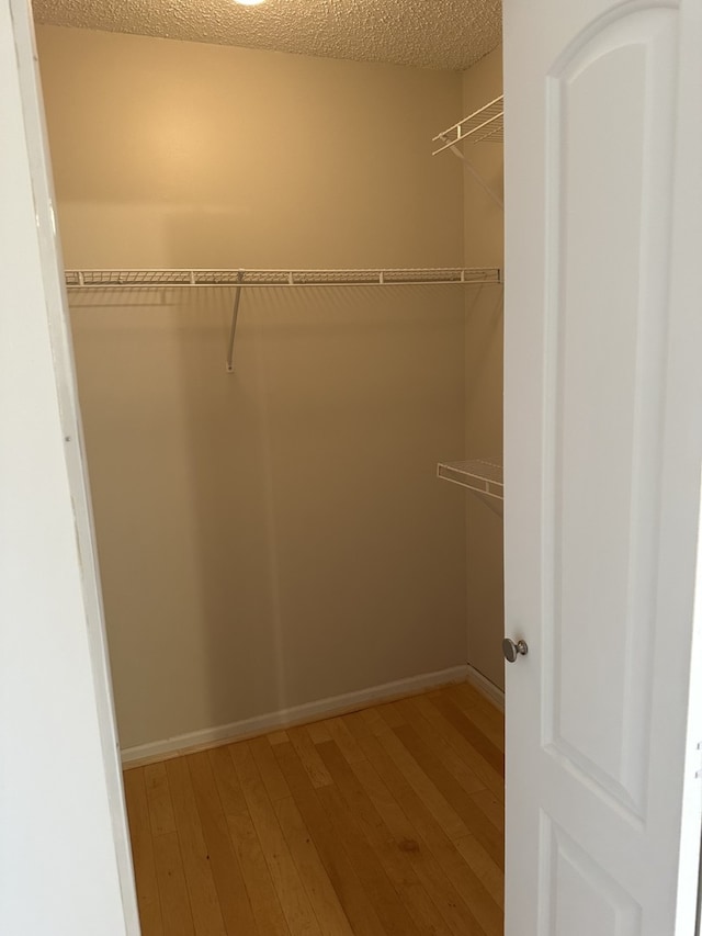 1326 Post Oak Ct Unit 1, Crest Hill, IL 60403 - spacious closet with light wood finished floors