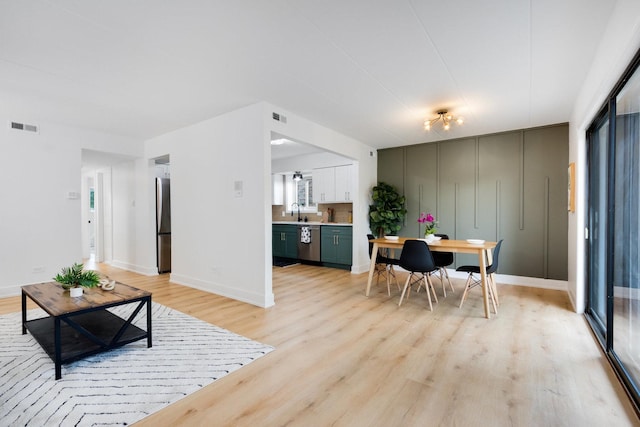 7925 Paxton Ave Unit 1A, Tinley Park, IL 60477 - living area featuring light wood-type flooring and baseboards