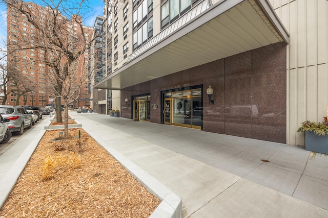 1313 N Ritchie Ct Unit 2001, Chicago, IL 60610 - doorway to property featuring board and batten siding
