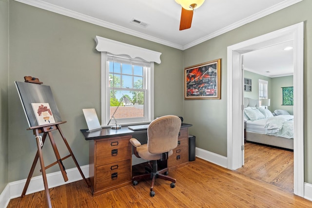 7317 W Greenleaf St, Chicago, IL 60631 - home office featuring wood finished floors, baseboards, and crown molding